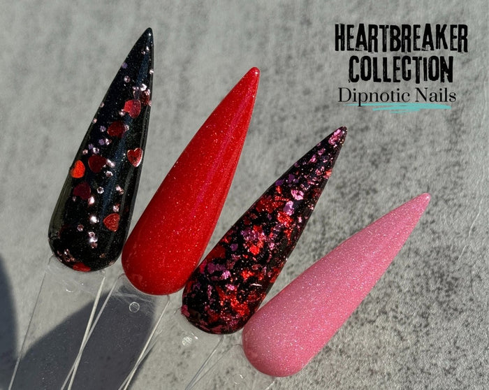 Photo shows swatch of Dipnotic Nails Left on Red- Red Shimmer Nail Dip Powder- The Heartbreaker Collection