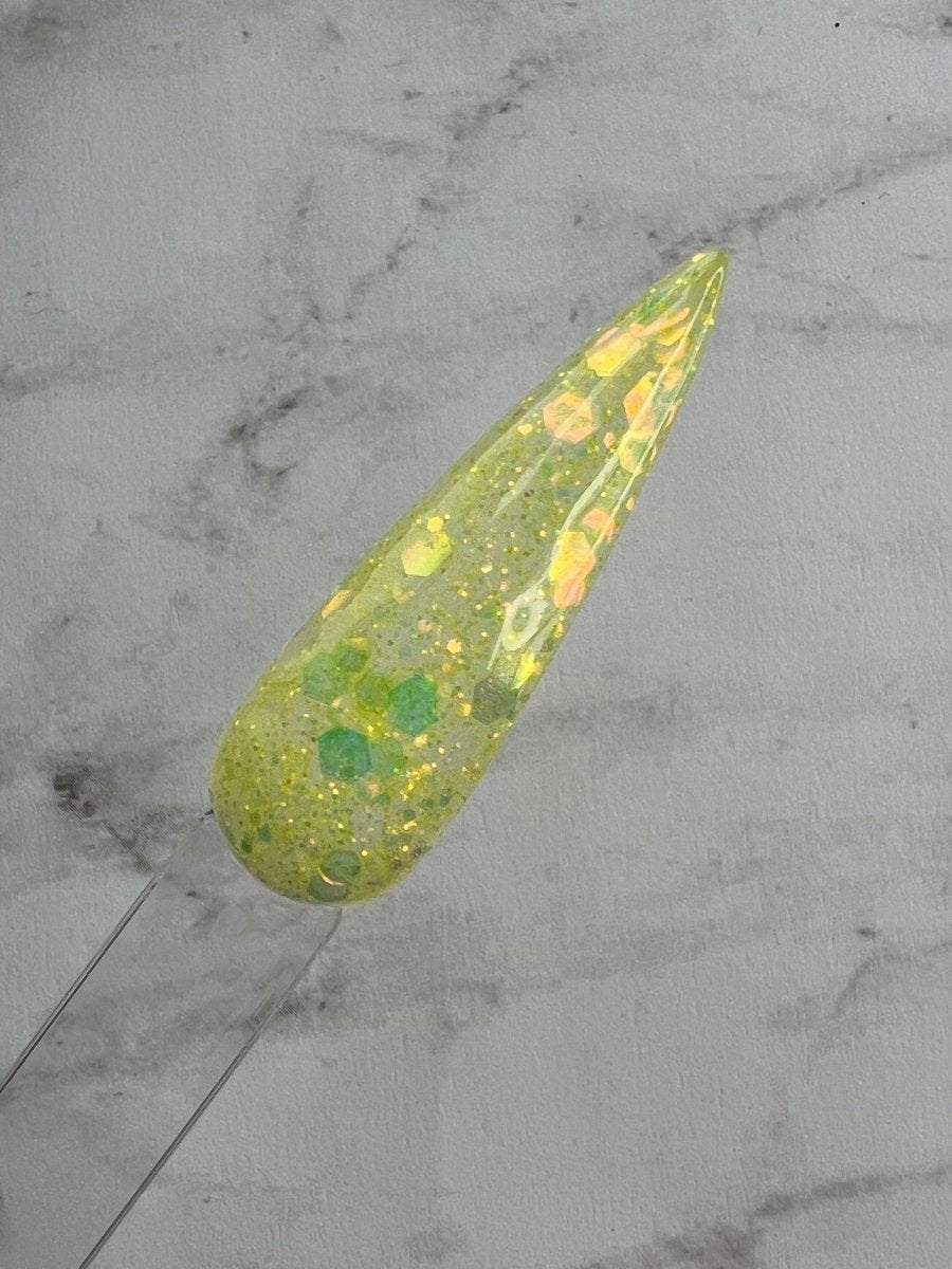 Photo shows swatch of Dipnotic Nails Lemon Drop Neon Yellow Nail Dip Powder
