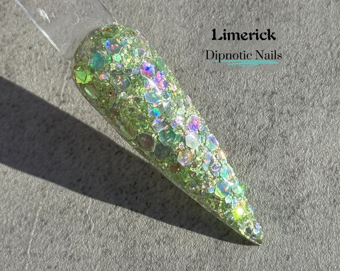 Photo shows swatch of Dipnotic Nails Limerick Green Nail Dip Powder The Emerald Isle Collection Pt. 2