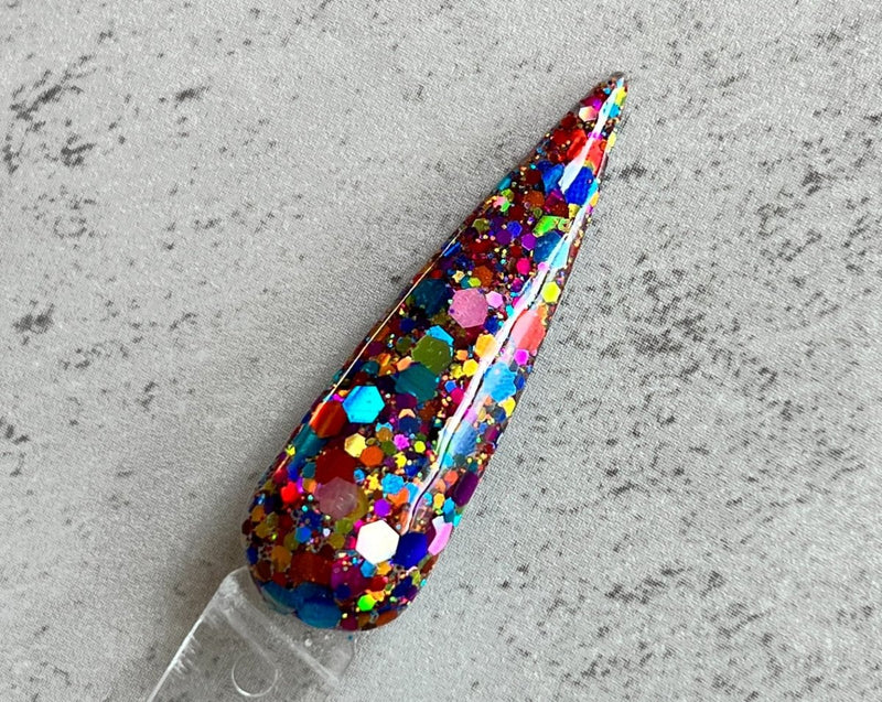 Photo shows swatch of Dipnotic Nails Love Wins Rainbow Pride Glitter Nail Dip Powder