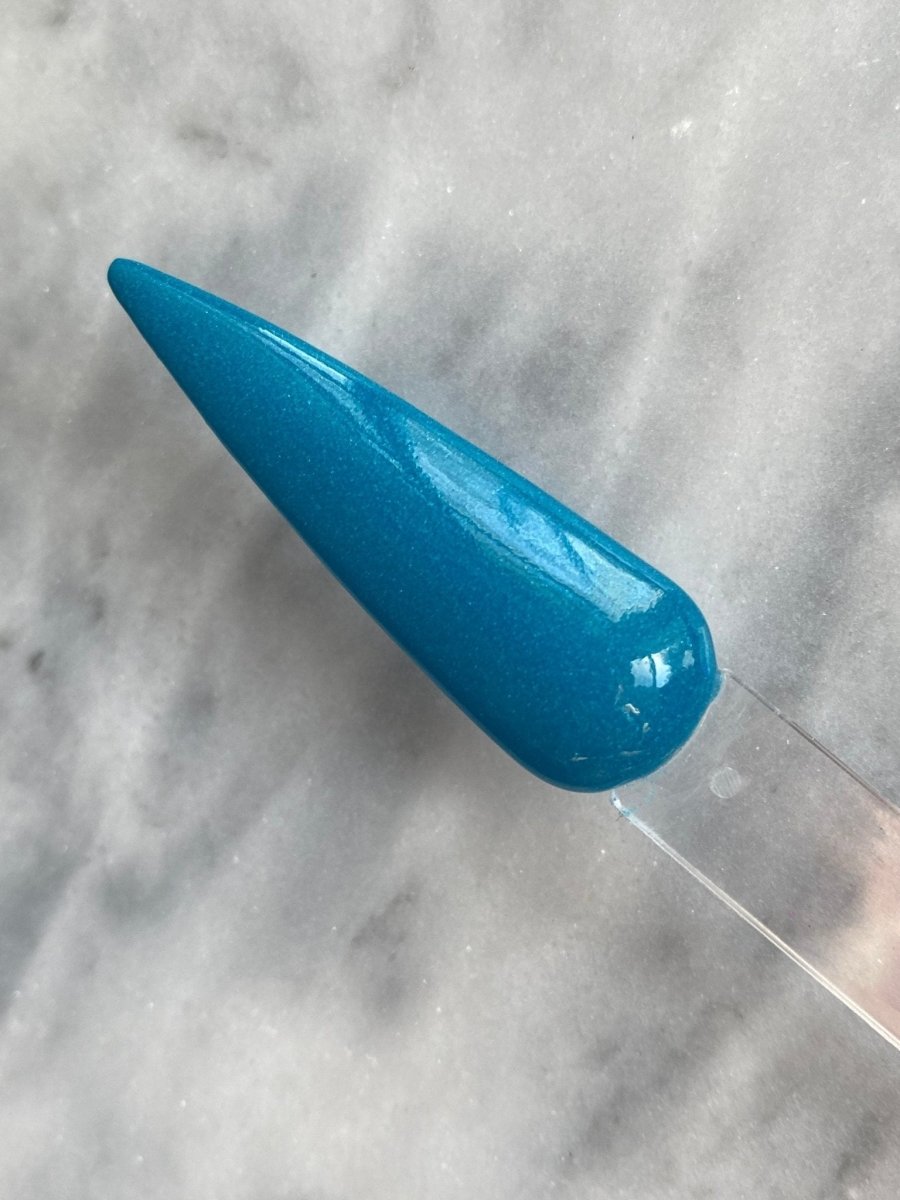 Photo shows swatch of Dipnotic Nails Marina Blue Nail Dip Powder