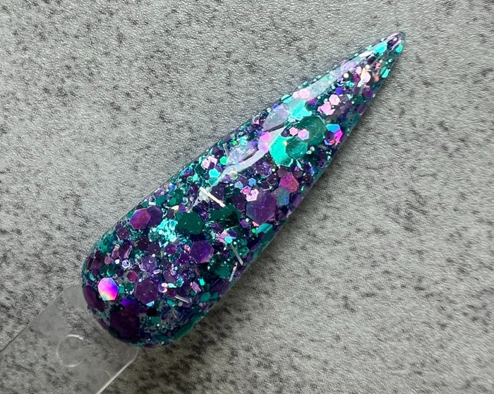 Photo shows swatch of Dipnotic Nails Mermaid Parade Teal Purple and Silver Holographic Nail Dip Powder The Mermaid Magic Collection