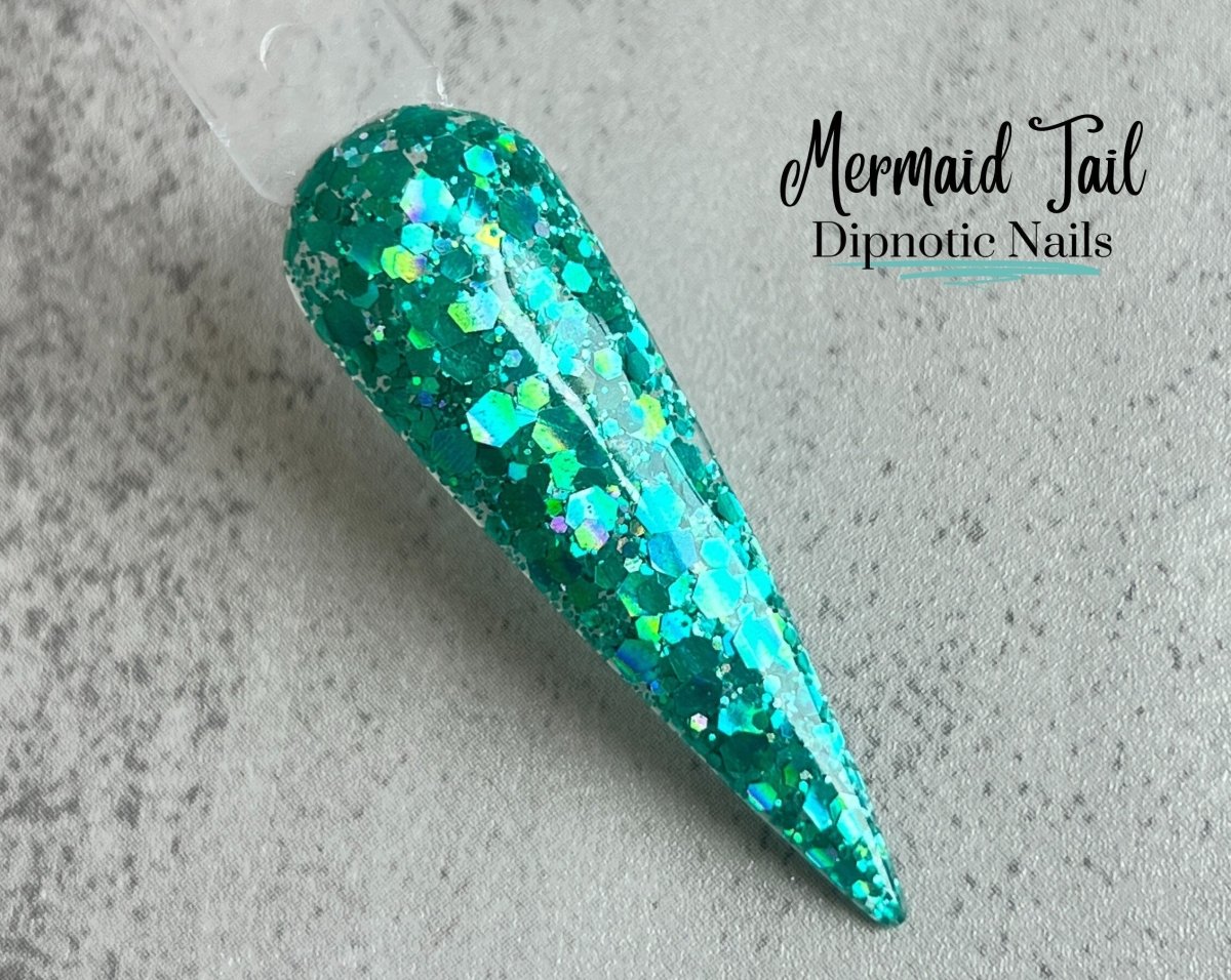 Photo shows swatch of Dipnotic Nails Mermaid Tail Teal Blue Holographic Nail Dip Powder The Mermaid Magic Collection