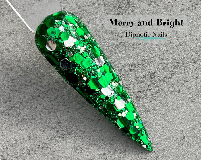 Photo shows swatch of Dipnotic Nails Merry and Bright Green and Silver Nail Dip Powder The Christmas Brights Collection