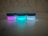 Photo shows swatch of Dipnotic Nails Mini Glow Dip Powder Kit- Make Any Dip Powder Glow