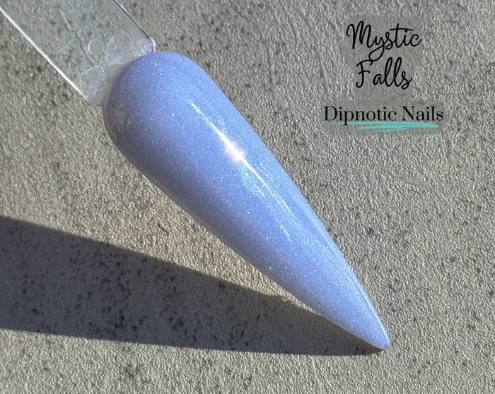 Photo shows swatch of Dipnotic Nails Mystic Falls Periwinkle Dip Powder- The Enchanted Waters Collection
