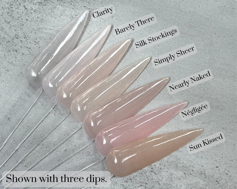 Photo shows swatch of Dipnotic Nails Nearly Naked Sheer Nude Pink Nail Dip Powder The Sheer Nude Collection