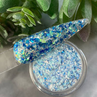 Photo shows swatch of Dipnotic Nails Ocean Mosaic Blue Nail Dip Powder