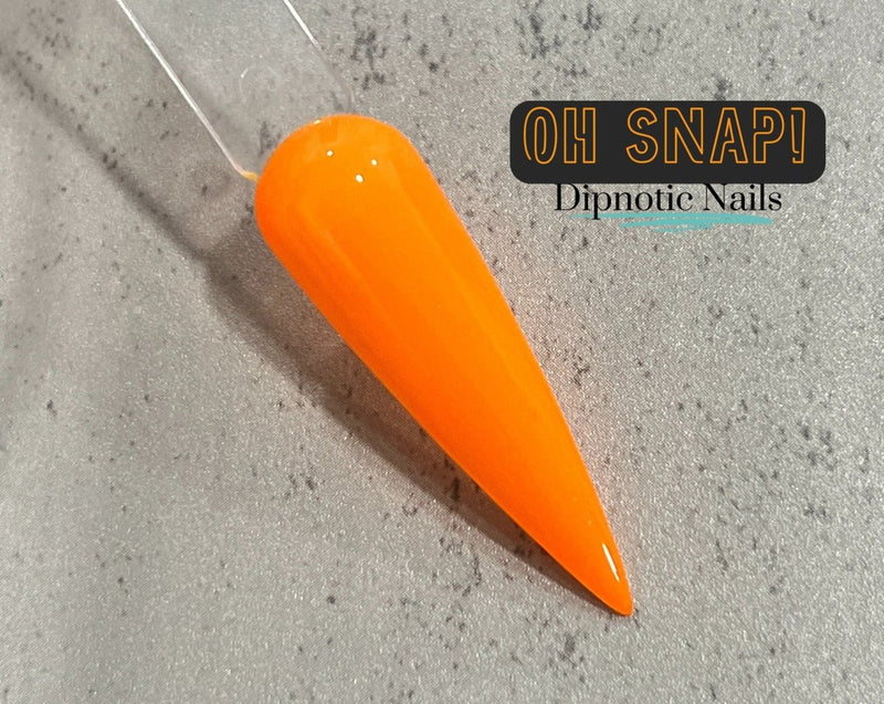 Photo shows swatch of Dipnotic Nails Oh Snap! Orange Nail Dip Powder The Nineties Collection