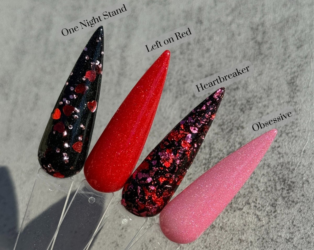Photo shows swatch of Dipnotic Nails One Night Stand Black, Red, and Pink Nail Dip Powder- The Heartbreaker Collection