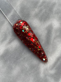 Photo shows swatch of Dipnotic Nails Peppermint Twist Red Christmas Nail Dip Powder
