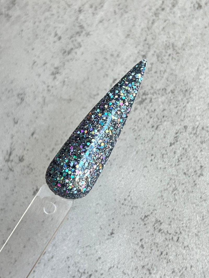 Photo shows swatch of Dipnotic Nails Pikes Peak Holographic Gunmetal Silver Dip Powder The Colorado Winter Collection