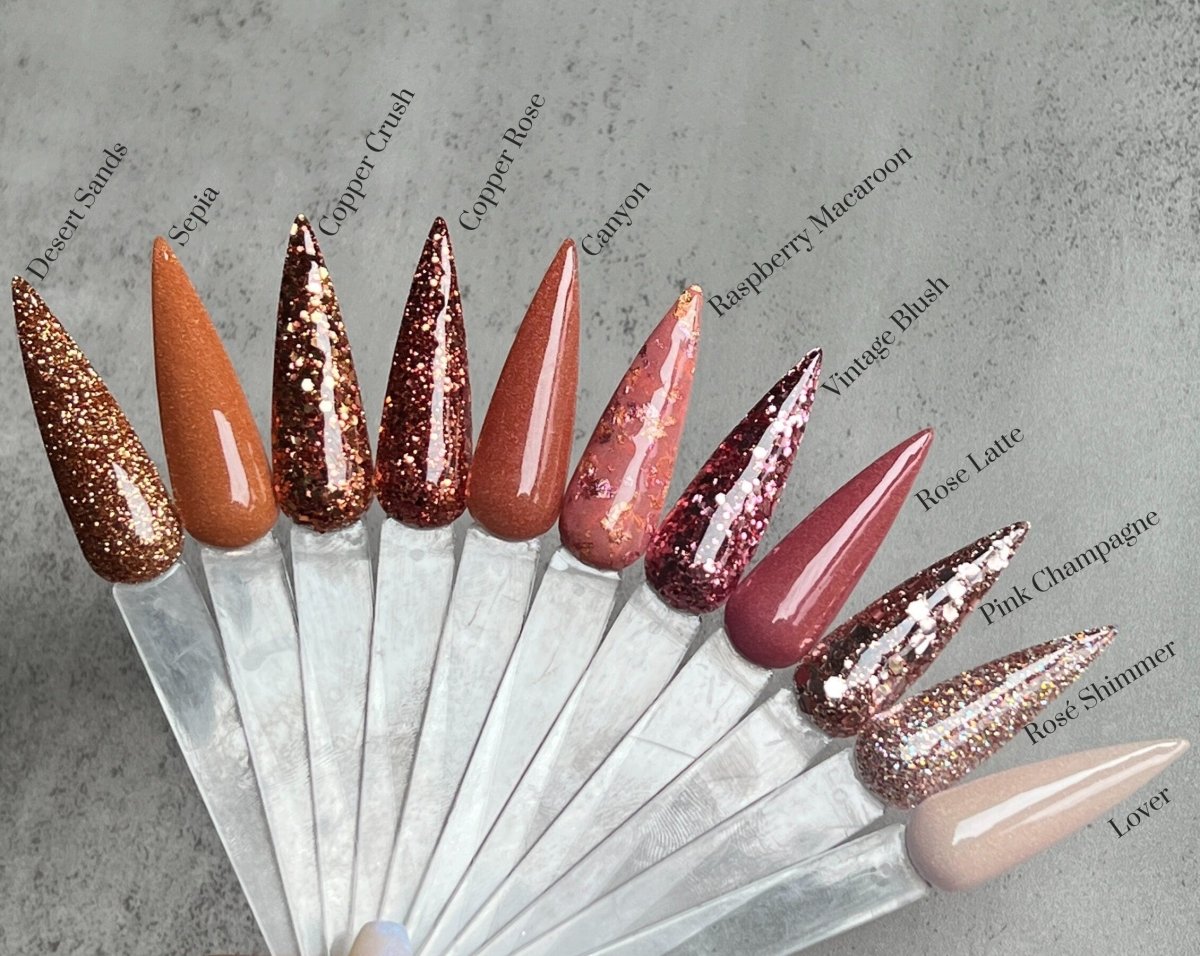Photo shows swatch of Dipnotic Nails Pink Champagne Rose Gold Nail Dip Powder Copper Rose Collection