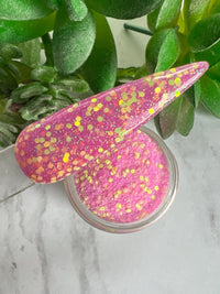Photo shows swatch of Dipnotic Nails Pink Lemonade Dip Powder