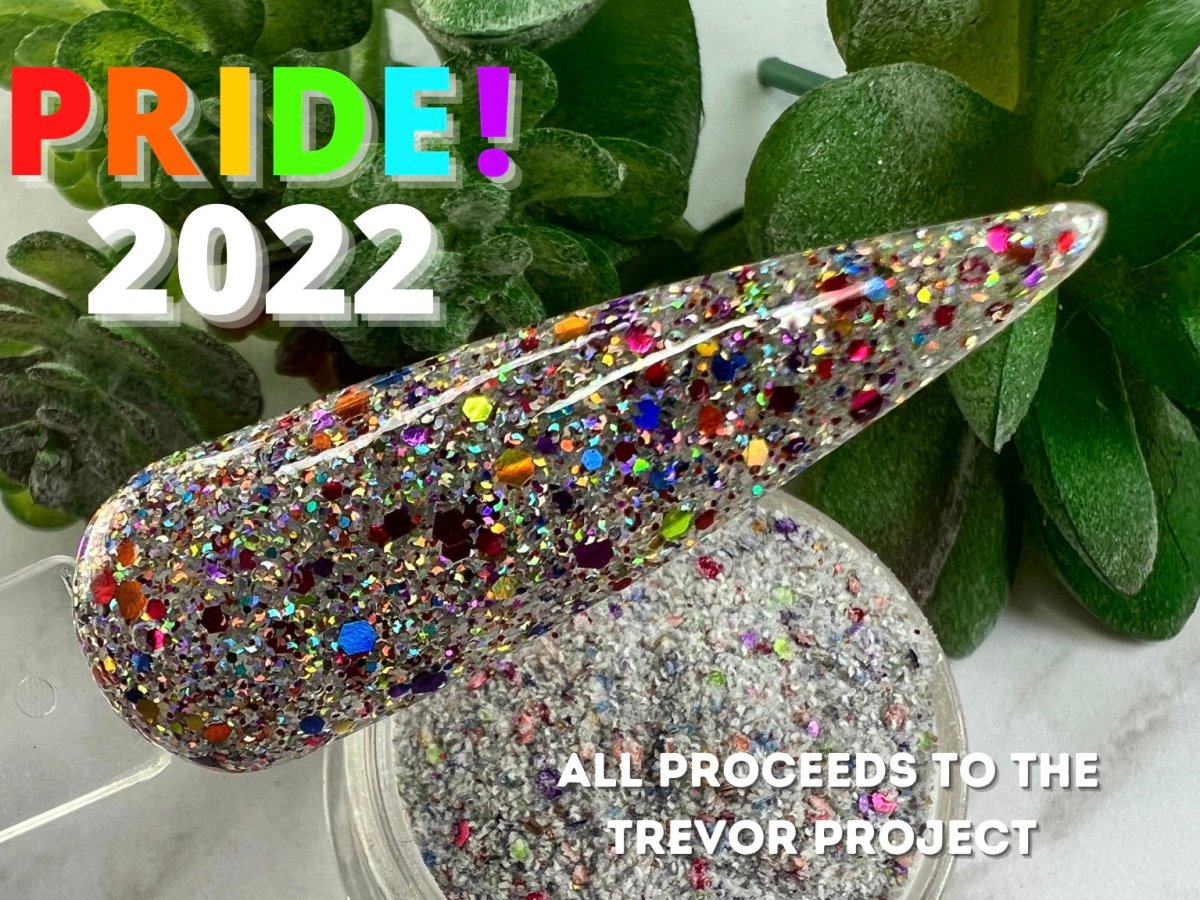 Photo shows swatch of Dipnotic Nails Pride Parade Rainbow Pride Glitter Nail Dip Powder