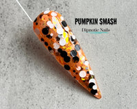 Photo shows swatch of Dipnotic Nails Pumpkin Smash Orange, Black, and White Nail Dip Powder Halloween 2023 Collection