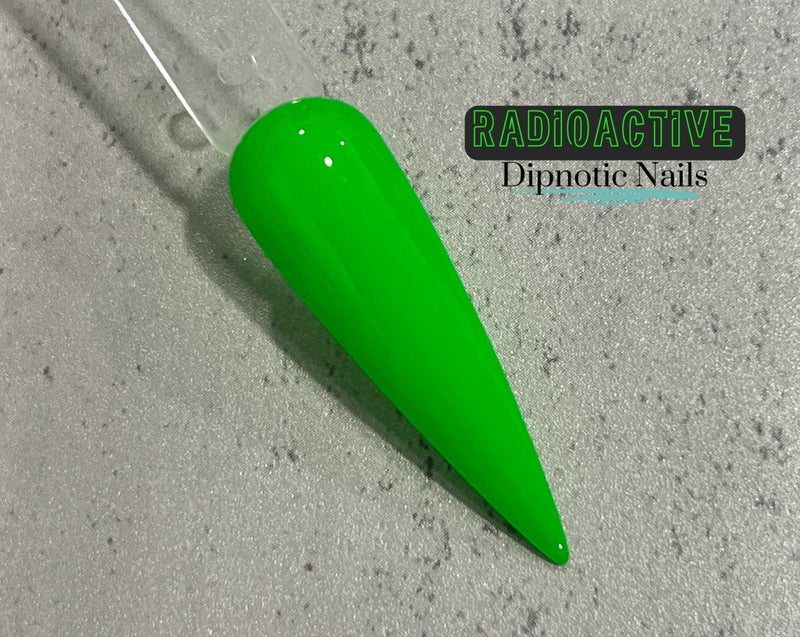 Photo shows swatch of Dipnotic Nails Radio Active Neon Green Nail Dip Powder- The Neon Collection