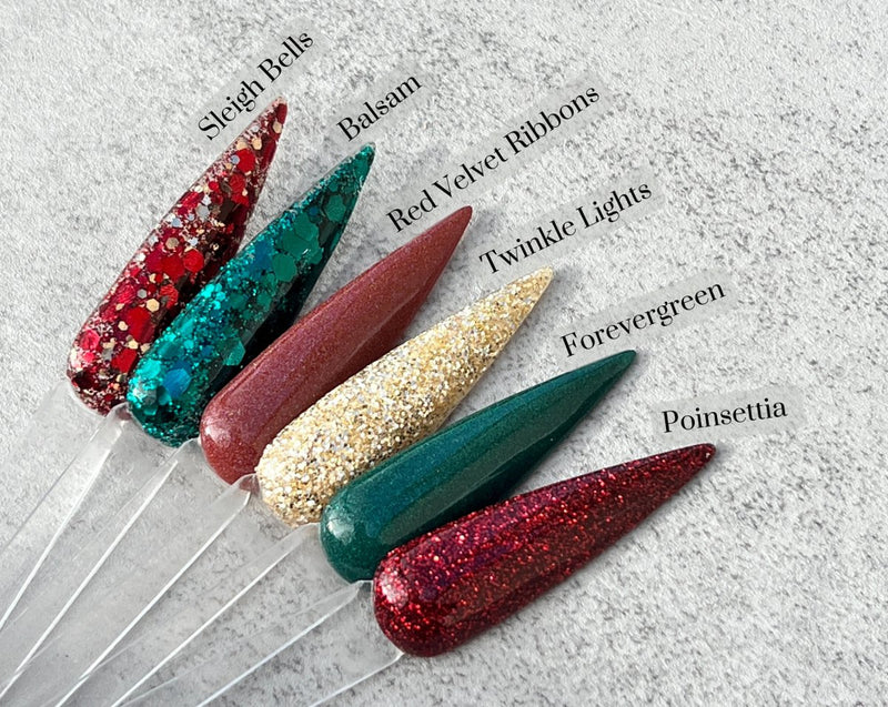 Photo shows swatch of Dipnotic Nails Red Velvet Ribbons Red Chameleon Chrome Nail Dip Powder The Deck the Halls Collection