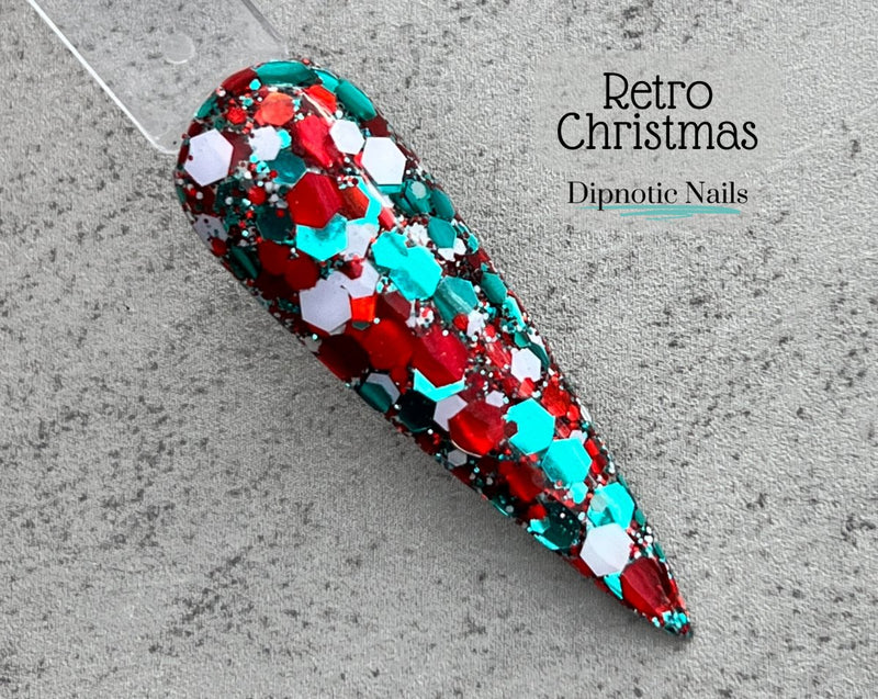 Photo shows swatch of Dipnotic Nails Retro Christmas Red, Teal, and White Nail Dip Powder The Vintage Christmas Collection