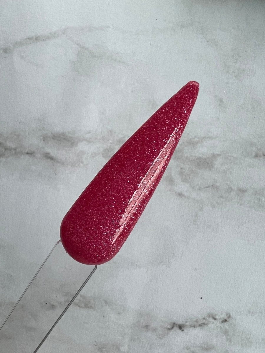 Photo shows swatch of Dipnotic Nails Rhodonite Dark Pink Nail Dip Powder