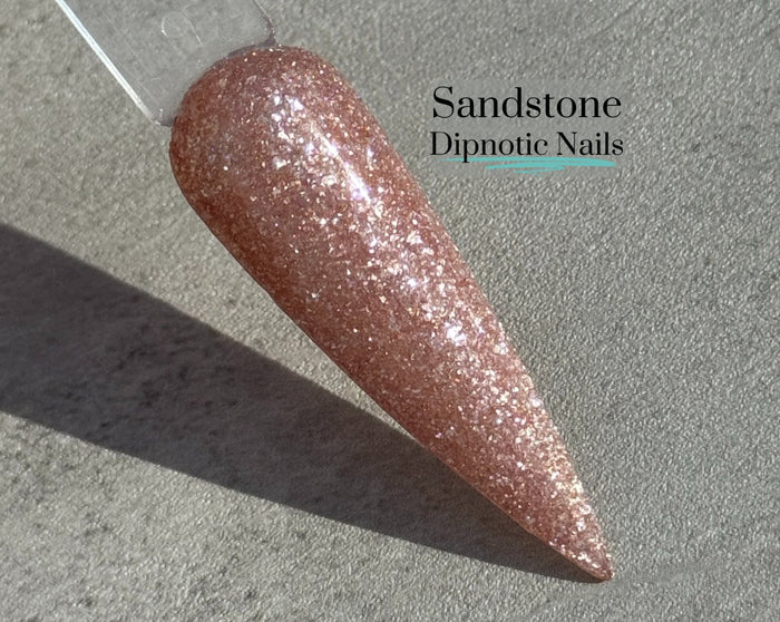 Photo shows swatch of Dipnotic Nails Sandstone Tan Nail Dip Powder