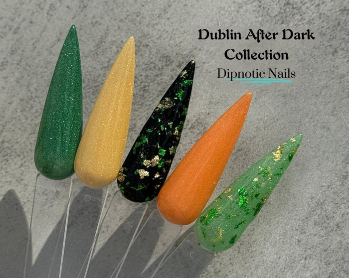 Photo shows swatch of Dipnotic Nails Shenanigans Green and Gold Foil Nail Dip Powder The Dublin After Dark Collection