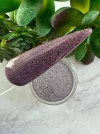 Photo shows swatch of Dipnotic Nails Shine Purple Reflective Glitter Nail Dip Powder