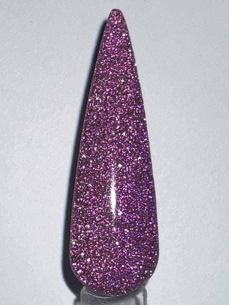 Photo shows swatch of Dipnotic Nails Shine Purple Reflective Glitter Nail Dip Powder