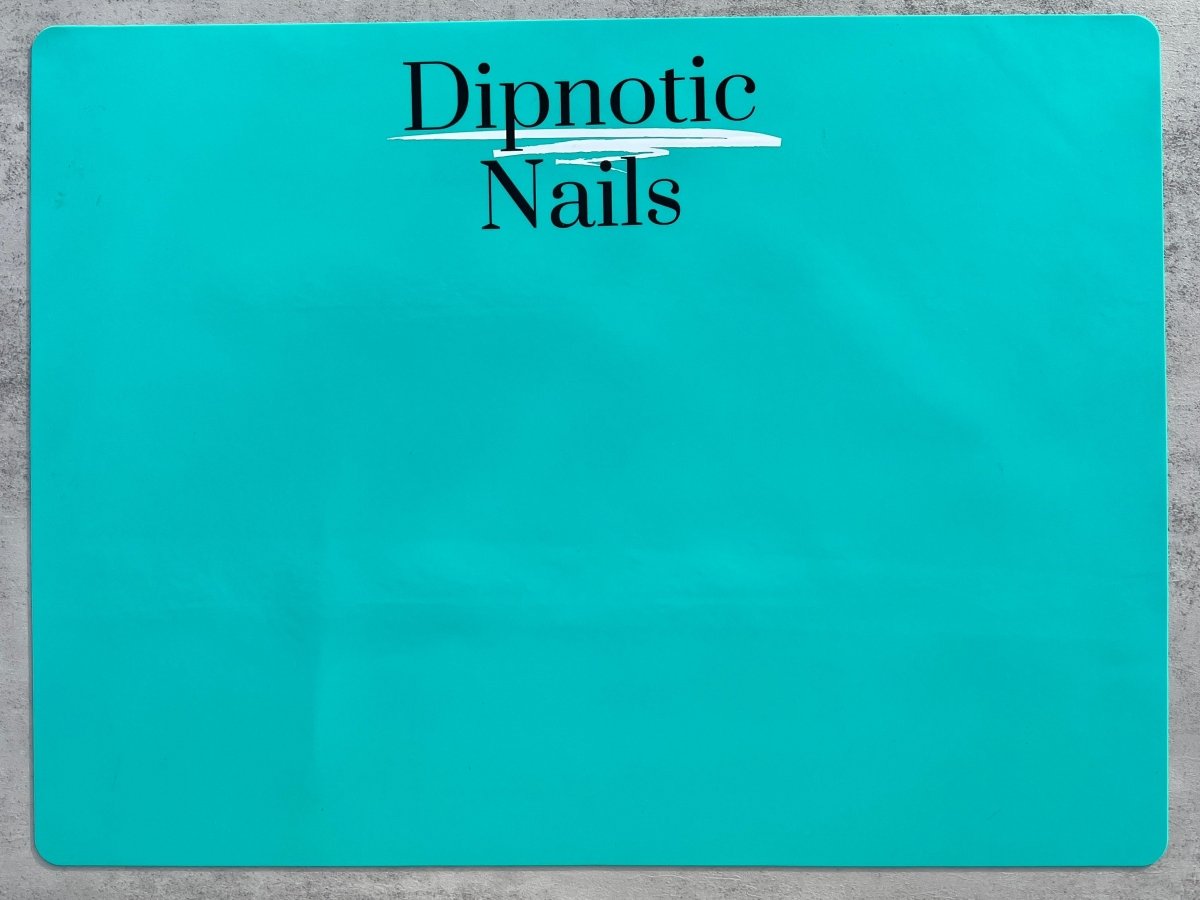 Photo shows swatch of Dipnotic Nails Silicone Nail Mat Table Protector