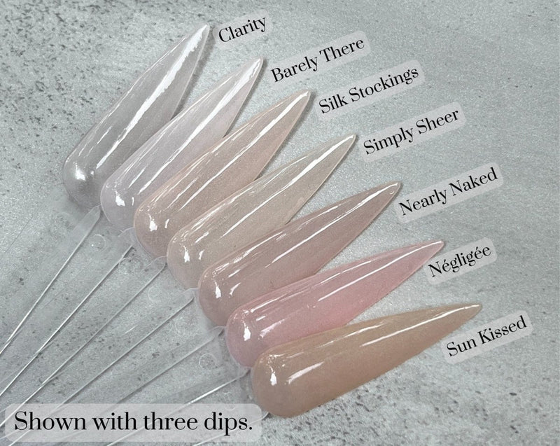 Photo shows swatch of Dipnotic Nails Silk Stockings Sheer Nude Nail Dip Powder The Sheer Nude Collection