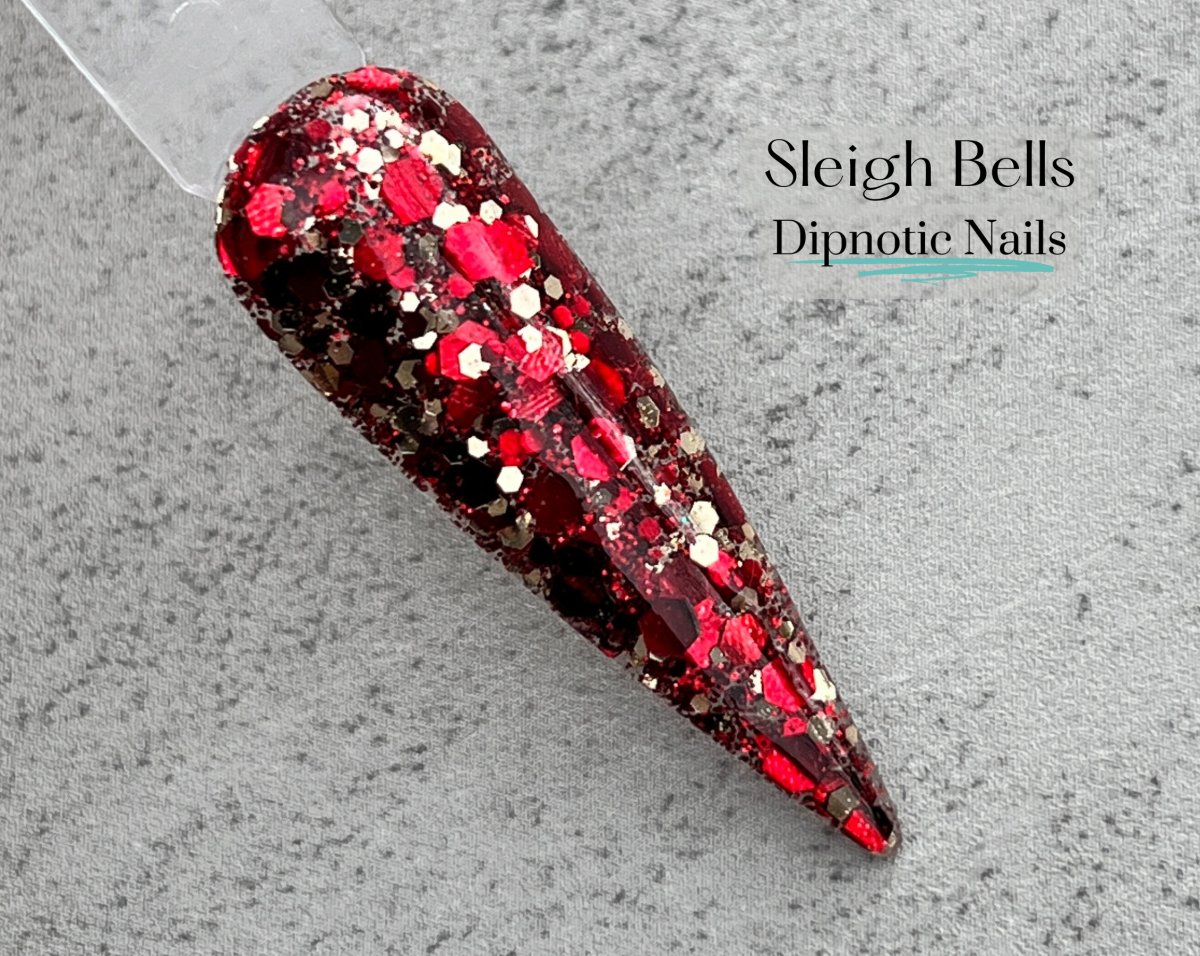 Photo shows swatch of Dipnotic Nails Sleigh Bells Red and Gold Nail Dip Powder The Deck the Halls Collection