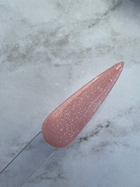 Photo shows swatch of Dipnotic Nails Snap Dragon Pink Nail Dip Powder