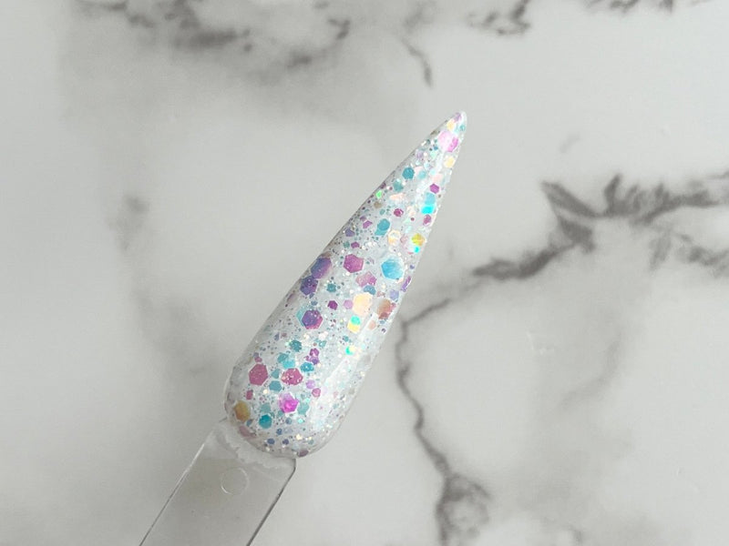 Photo shows swatch of Dipnotic Nails Snow Drop White Nail Dip Powder The Frozen Fairy Collection