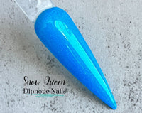 Photo shows swatch of Dipnotic Nails Snow Queen Blue Nail Dip Powder The Frozen Fairy Collection
