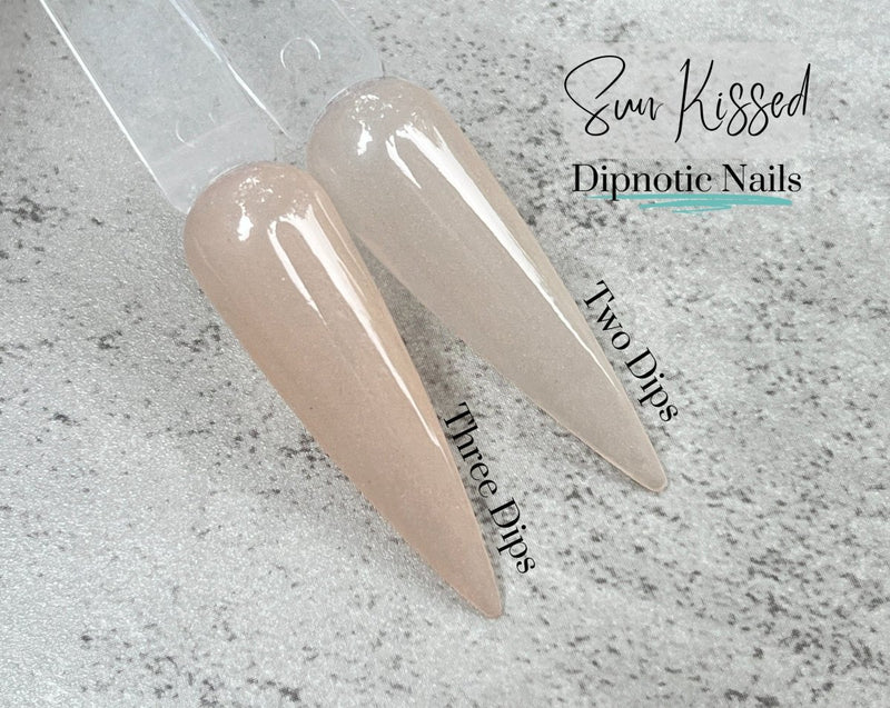 Photo shows swatch of Dipnotic Nails Sun Kissed Sheer Nude Nail Dip Powder The Sheer Nude Collection