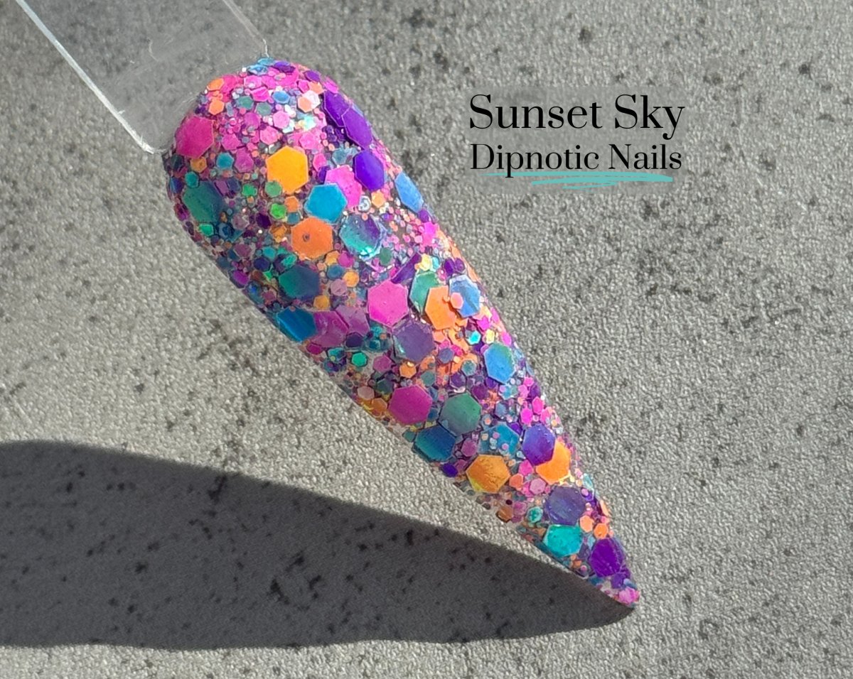 Photo shows swatch of Dipnotic Nails Sunset Sky Nail Dip Powder