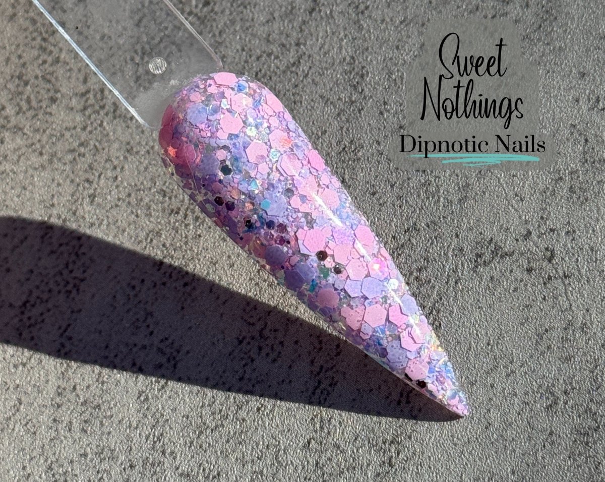 Photo shows swatch of Dipnotic Nails Sweet Nothings Pink and Purple Nail Dip Powder- The Sweetheart Collection