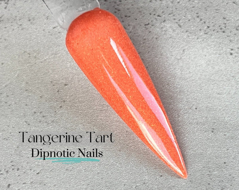 Photo shows swatch of Dipnotic Nails Tangerine Tart Orange Nail Dip Powder The Citrus Sunrise Collection