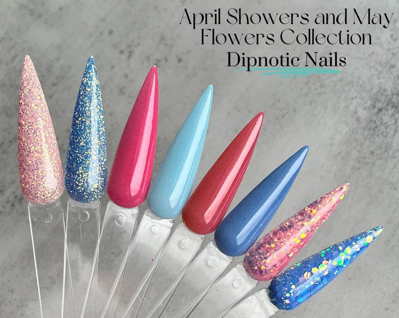 Photo shows swatch of Dipnotic Nails The April Showers and May Flowers Collection Blue and Pink Spring Dip Powder Collection