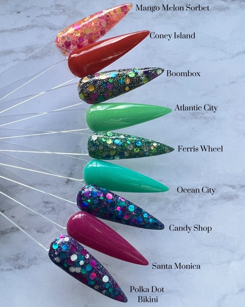 Photo shows swatch of Dipnotic Nails The Boardwalk Collection Dot Glitter Nail Dip Powder Collection