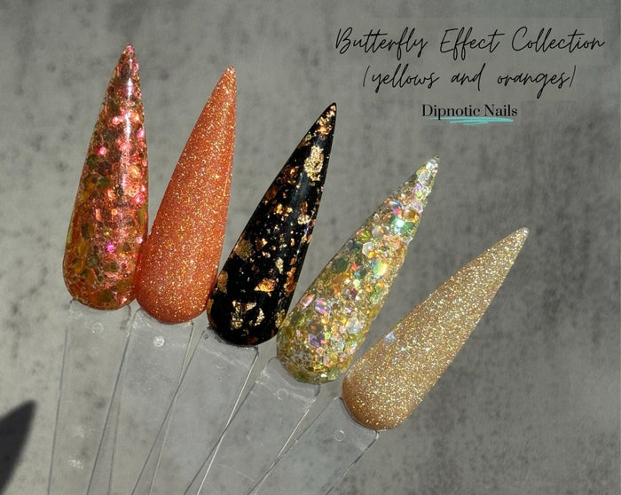 Photo shows swatch of Dipnotic Nails The Butterfly Effect Collection Yellows and Oranges- Spring Butterfly Nail Dip Powder Collection