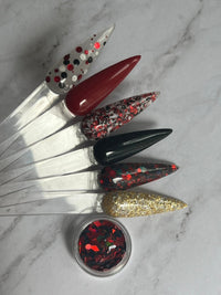Photo shows swatch of Dipnotic Nails The Casino Collection Red Black and White Glitter Nail Dip Powder Collection