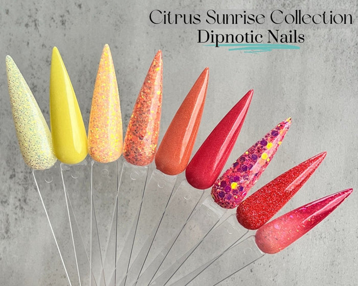 Photo shows swatch of Dipnotic Nails The Citrus Sunrise Collection Coral Orange and Yellow Nail Dip Powder Collection