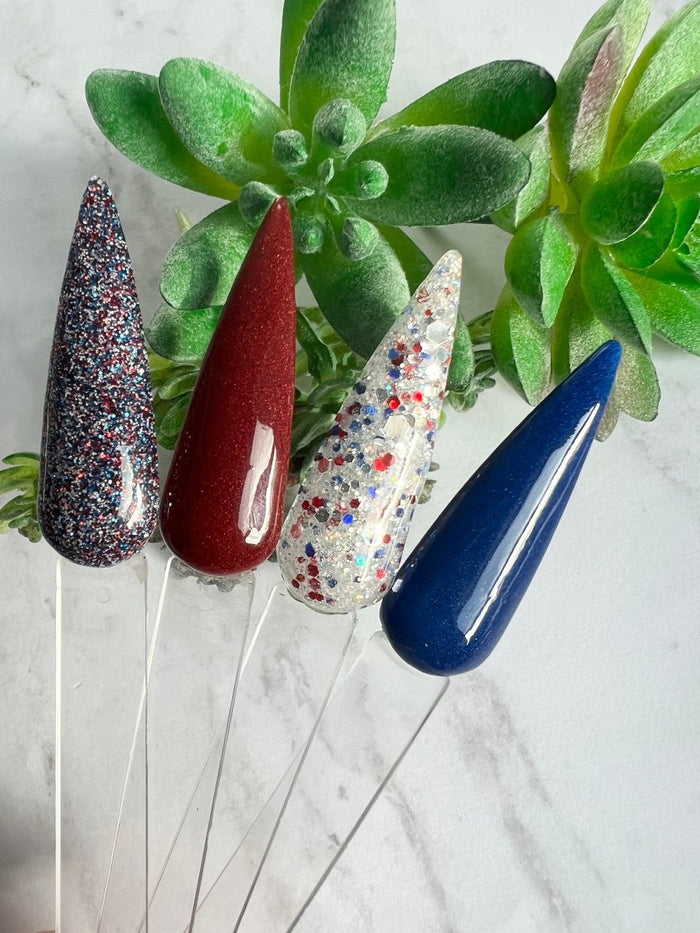 Photo shows swatch of Dipnotic Nails The Fourth of July Collection Red White and Blue Nail Dip Powder Collection