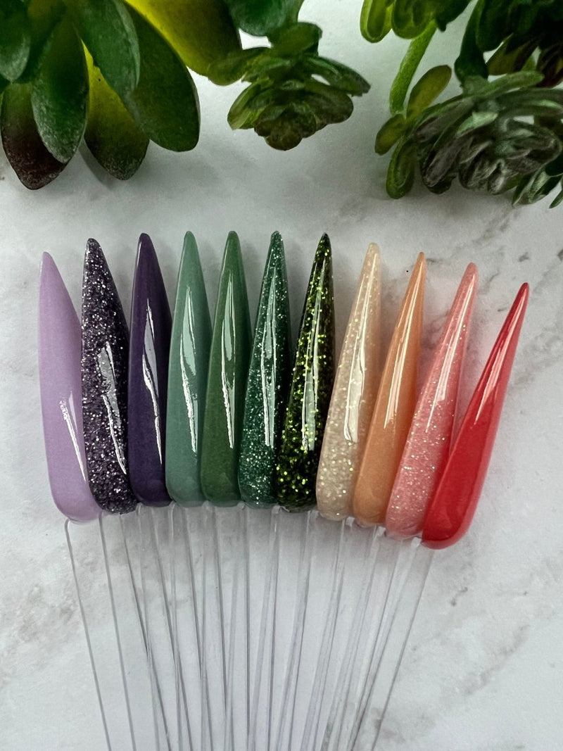 Photo shows swatch of Dipnotic Nails The Garden Collection Nail Dip Powder Collection