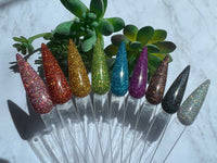 Photo shows swatch of Dipnotic Nails The Hello Holo Collection Holographic Glitter Nail Dip Powder Collection