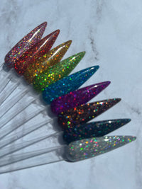 Photo shows swatch of Dipnotic Nails The Hello Holo Collection Holographic Glitter Nail Dip Powder Collection