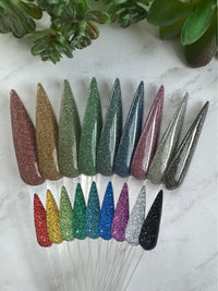 Photo shows swatch of Dipnotic Nails The Reflective Collection Reflective Glitter Nail Dip Powder