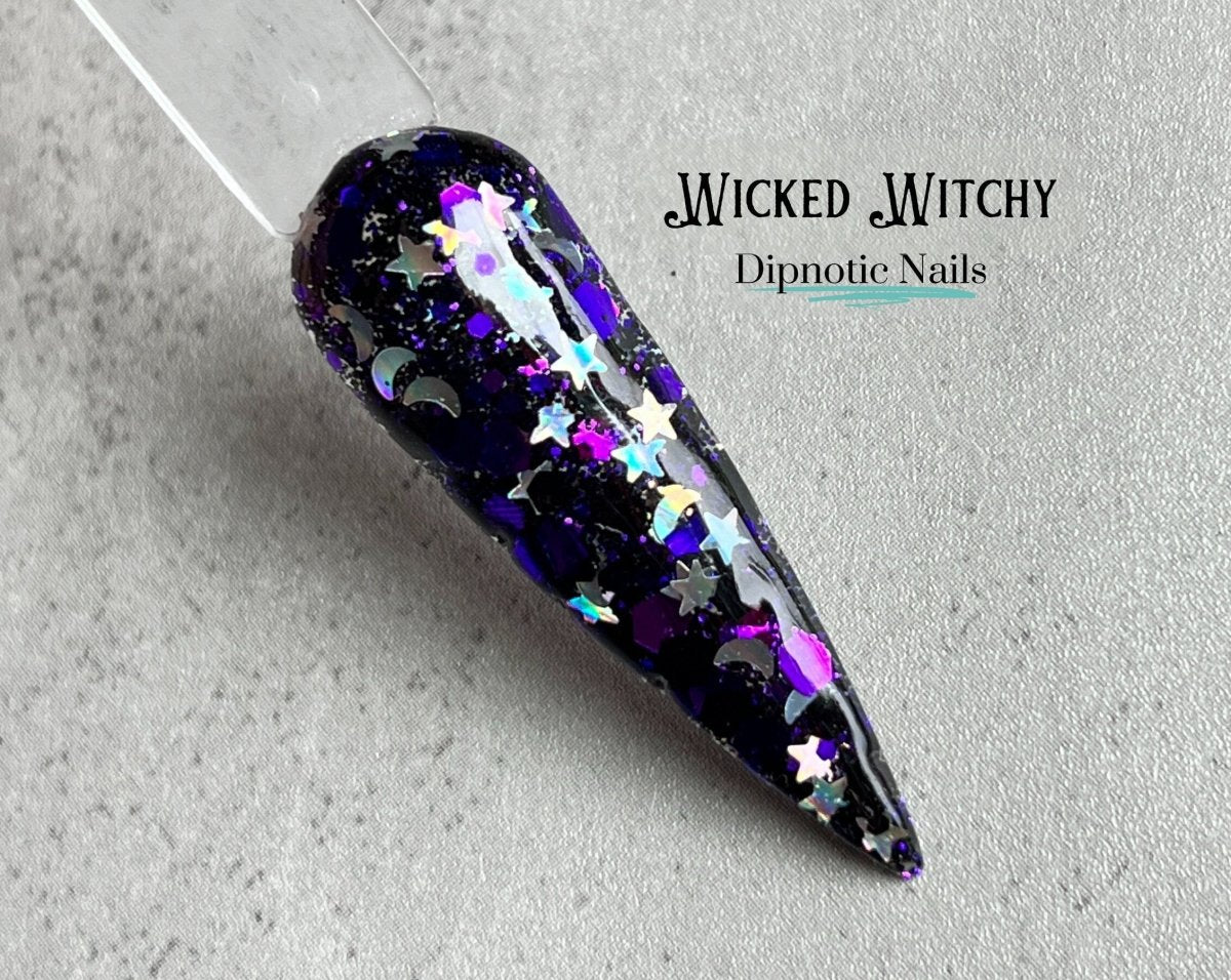 Photo shows swatch of Dipnotic Nails Wicked Witchy Dark Purple, Black, and Silver Nail Dip Powder The Wicked Witchy Collection