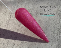 Photo shows swatch of Dipnotic Nails Wine and Dine Dark Pink Nail Dip Powder- Raspberry Romance Collection